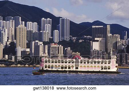 Ferry in the sea in front of skyscrapers, Hong Kong, China View Large Photo Image Stock Photo - Ferry in the sea in front of skyscrapers, Hong Kong, China. Fotosearch