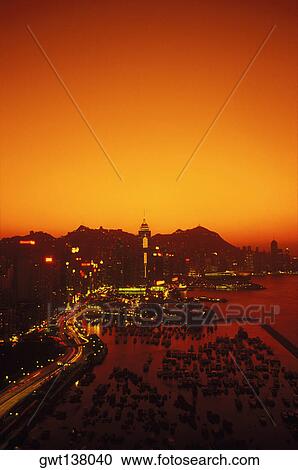 High angle view of a city lit up at dusk, Hong Kong, China View Large Photo Image Stock Image - High angle view of a city lit up at dusk, Hong Kong, China. Fotosearch