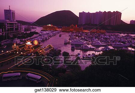 Stock Photo - High angle view of boats moored at a harbor, Hong Kong, China. Fotosearch