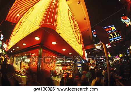 Low angle view of a building lit up at night, Hong Kong, China View Large Photo Image Stock Photograph - Low angle view of a building lit up at night, Hong Kong, China. Fotosearch