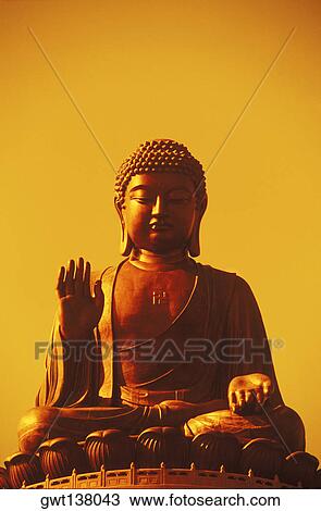 Stock Image - Low angle view of the statue of Buddha, Po Lin Monastery, Hong Kong, China. Fotosearch
