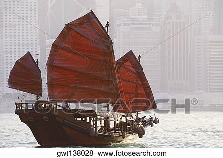 Stock Photo - Sailboat in the sea, Hong Kong, China. Fotosearch