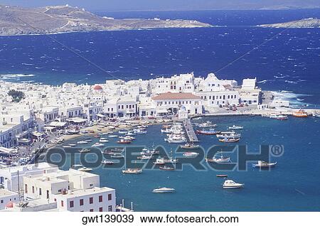 Stock Photo - Aerial view of boats moored in the sea. Fotosearch