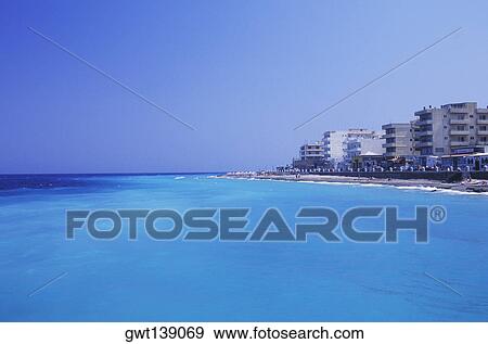 Buildings at the waterfront View Large Photo Image Stock Photo - Buildings at the waterfront. Fotosearch