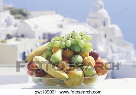 Close-up of a fruit in a bowl View Large Photo Image Stock Image - Close-up of a fruit in a bowl. Fotosearch