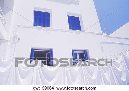 Picture - Clothes hanging on a clothesline. Fotosearch
