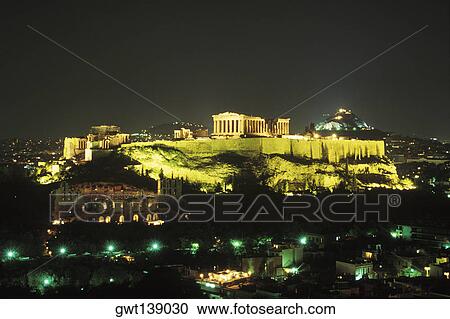 High angle view of buildings in a city lit up at night, Parthenon, Athens, Greece View Large Photo Image Stock Image - High angle view of buildings in a city lit up at night, Parthenon, Athens, Greece. Fotosearch