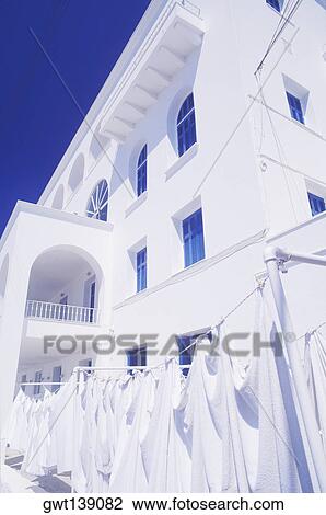 Low angle view of a building View Large Photo Image Stock Image - Low angle view of a building. Fotosearch