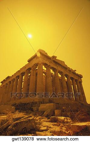 Low angle view of old ruin colonnades, Parthenon, Athens, Greece View Large Photo Image Stock Photo - Low angle view of old ruin colonnades, Parthenon, Athens, Greece. Fotosearch