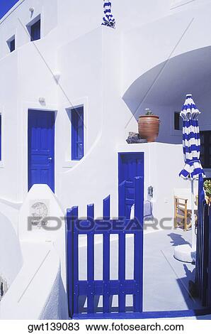 Patio umbrella on the porch of a house View Large Photo Image Stock Image - Patio umbrella on the porch of a house. Fotosearch