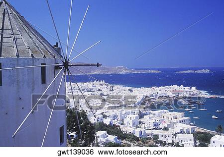 Stock Photograph - Traditional windmill in a city. Fotosearch