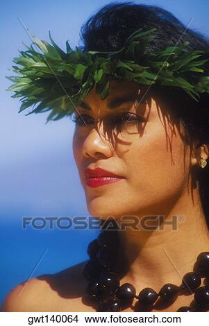 Picture - Close-up of a hula dancer wearing a necklace, Hawaii, USA. Fotosearch