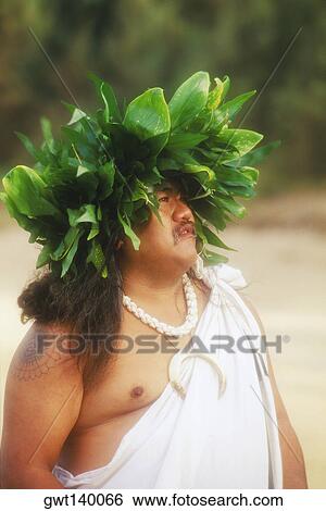 Close-up of a mid adult man wearing a headdress, Hawaii, USA View Large Photo Image Stock Photograph - Close-up of a mid adult man wearing a headdress, Hawaii, USA. Fotosearch