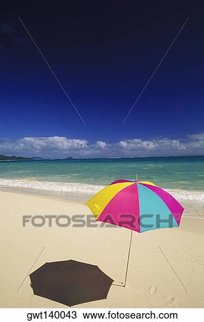High angle view of a beach umbrella on the beach, Hawaii, USA View Large Photo Image Stock Image - High angle view of a beach umbrella on the beach, Hawaii, USA. Fotosearch