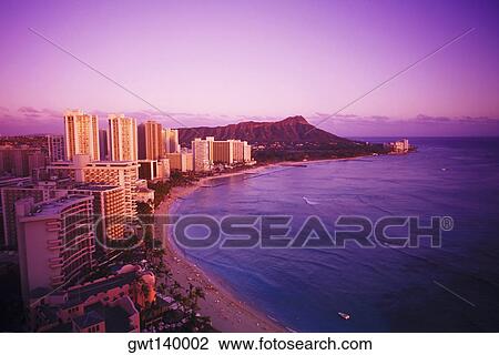 Stock Image - High angle view of buildings at the waterfront, Hawaii, USA. Fotosearch