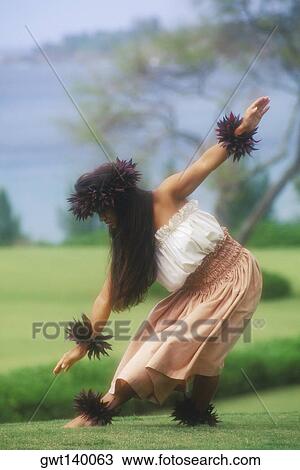 Hula dancer dancing on a lawn, Hawaii, USA View Large Photo Image Stock Image - Hula dancer dancing on a lawn, Hawaii, USA. Fotosearch