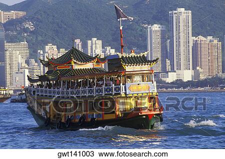 Stock Image - Ferry in the sea, Hong Kong, China. Fotosearch
