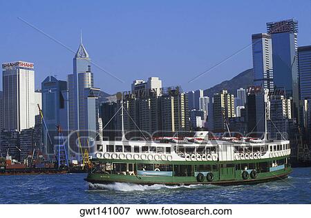 Ferry in the sea in front of skyscrapers, Hong Kong, China View Large Photo Image Stock Photo - Ferry in the sea in front of skyscrapers, Hong Kong, China. Fotosearch