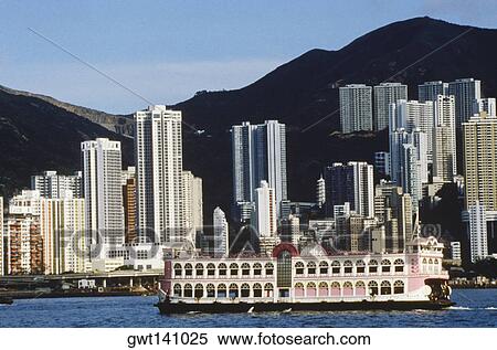 Ferry in the sea in front of skyscrapers, Hong Kong, China View Large Photo Image Stock Photography - Ferry in the sea in front of skyscrapers, Hong Kong, China. Fotosearch