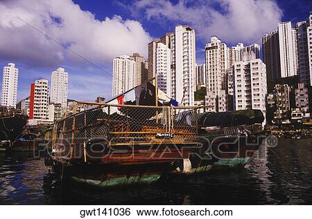 Stock Photograph - Houseboat in the sea, Hong Kong, China. Fotosearch