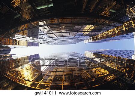 Low angle view of skyscrapers in a city, Hong Kong, China View Large Photo Image Stock Image - Low angle view of skyscrapers in a city, Hong Kong, China. Fotosearch