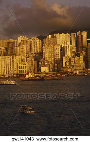 Skyscraper at the waterfront, Hong Kong, China View Large Photo Image Stock Image - Skyscraper at the waterfront, Hong Kong, China. Fotosearch