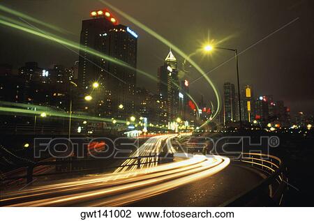 Stock Image - Traffic moving on a highway, Hong Kong, China. Fotosearch