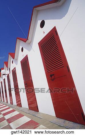 Stock Image - Changing cubicles on the beach, Italy. Fotosearch