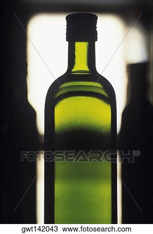 Close-up of a bottle of olive oil View Large Photo Image Stock Image - Close-up of a bottle of olive oil. Fotosearch
