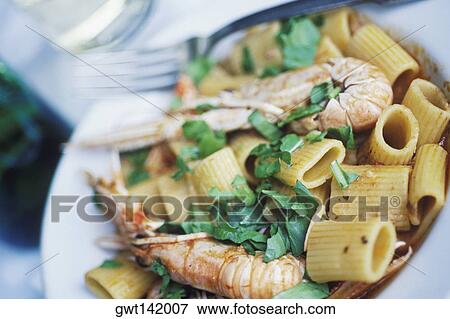 Close-up of seafood in a plate View Large Photo Image Stock Photo - Close-up of seafood in a plate. Fotosearch