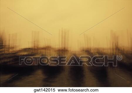 Defocused view of boats moored at a dock, Italy View Large Photo Image Stock Photography - Defocused view of boats moored at a dock, Italy. Fotosearch