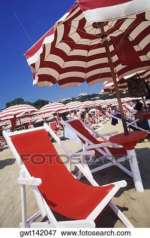 Folding chairs on the beach, Italy View Large Photo Image Stock Photo - Folding chairs on the beach, Italy. Fotosearch