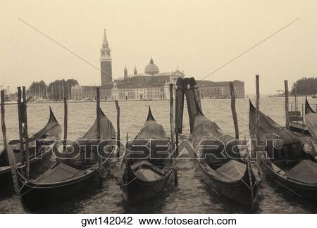 Gondolas moored at a dock, Italy View Large Photo Image Stock Image - Gondolas moored at a dock, Italy. Fotosearch