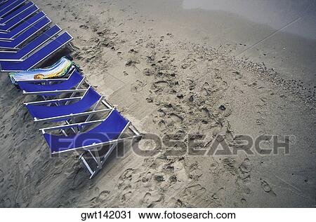 High angle view of beach chairs on the beach, Italy View Large Photo Image Stock Image - High angle view of beach chairs on the beach, Italy. Fotosearch