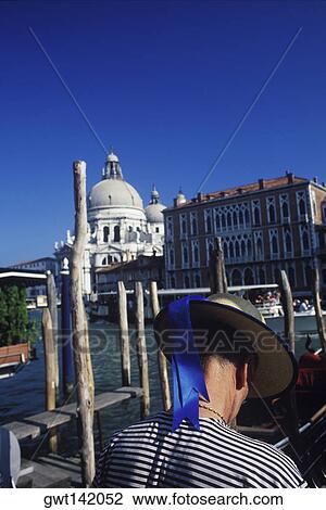 Rear view of a gondolier wearing a straw boater hat, Grand Canal, Venice, Veneto, Italy View Large Photo Image Stock Image - Rear view of a gondolier wearing a straw boater hat, Grand Canal, Venice, Veneto, Italy. Fotosearch