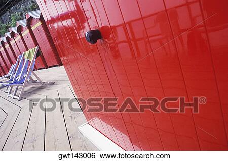 Beach huts with folding chairs, Italy View Large Photo Image Stock Photograph - Beach huts with folding chairs, Italy. Fotosearch