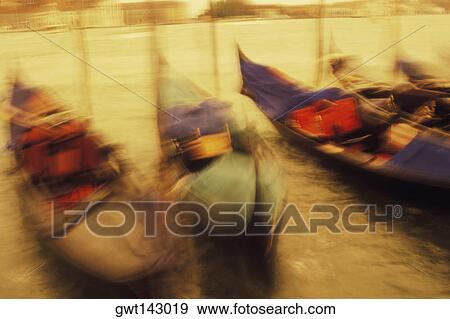 Boats moored at a dock, Italy View Large Photo Image Stock Photo - Boats moored at a dock, Italy. Fotosearch