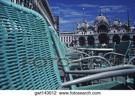 Chairs in front of a cathedral, St. Mark's Cathedral, Venice, Veneto, Italy View Large Photo Image Stock Image - Chairs in front of a cathedral, St. Mark's Cathedral, Venice, Veneto, Italy. Fotosearch