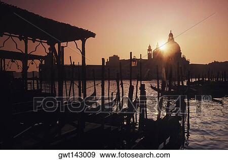 Gondolas moored at a dock, Italy View Large Photo Image Stock Photo - Gondolas moored at a dock, Italy. Fotosearch