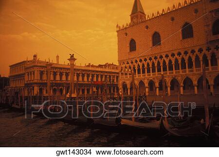 Gondolas moored in front of buildings, Italy View Large Photo Image Picture - Gondolas moored in front of buildings, Italy. Fotosearch