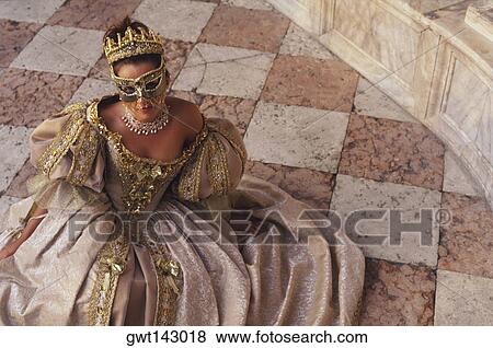 High angle view of a young woman in traditional clothing, Venice, Veneto, Italy View Large Photo Image Stock Photo - High angle view of a young woman in traditional clothing, Venice, Veneto, Italy. Fotosearch