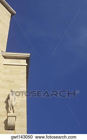 Low angle view of a statue on a wall, Italy View Large Photo Image Stock Image - Low angle view of a statue on a wall, Italy. Fotosearch