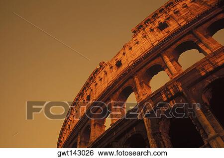 Low angle view of an amphitheater, Rome, Italy View Large Photo Image Stock Photograph - Low angle view of an amphitheater, Rome, Italy. Fotosearch