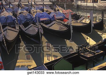Reflection of gondolas and a building in water, Italy View Large Photo Image Stock Image - Reflection of gondolas and a building in water, Italy. Fotosearch