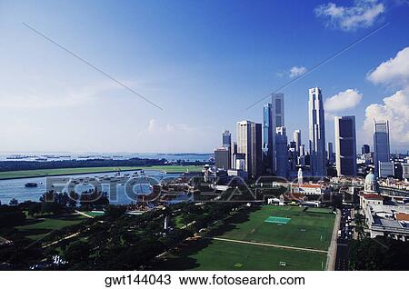 Stock Image - Buildings at the harbor, Singapore. Fotosearch