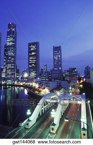 Buildings lit up at night, Singapore View Large Photo Image Stock Photo - Buildings lit up at night, Singapore. Fotosearch