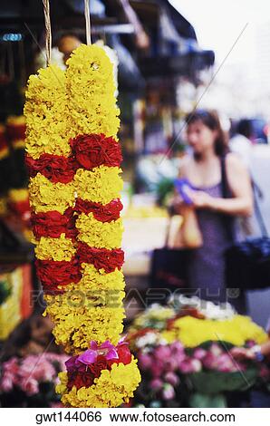 Stock Photograph - Close-up of a garland hanging, Singapore. Fotosearch