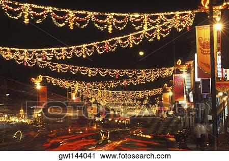 Electric lights in a city, Singapore View Large Photo Image Stock Image - Electric lights in a city, Singapore. Fotosearch