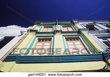 Low angle view of a building in a city, Singapore View Large Photo Image Stock Image - Low angle view of a building in a city, Singapore. Fotosearch