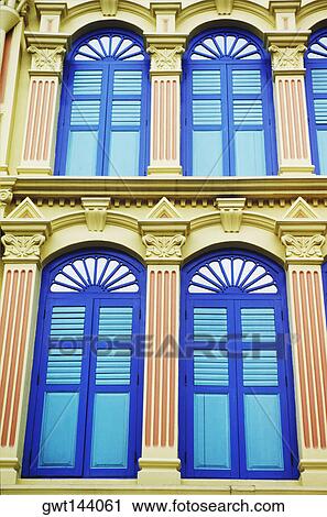 Stock Image - Low angle view of a building in a city, Singapore. Fotosearch